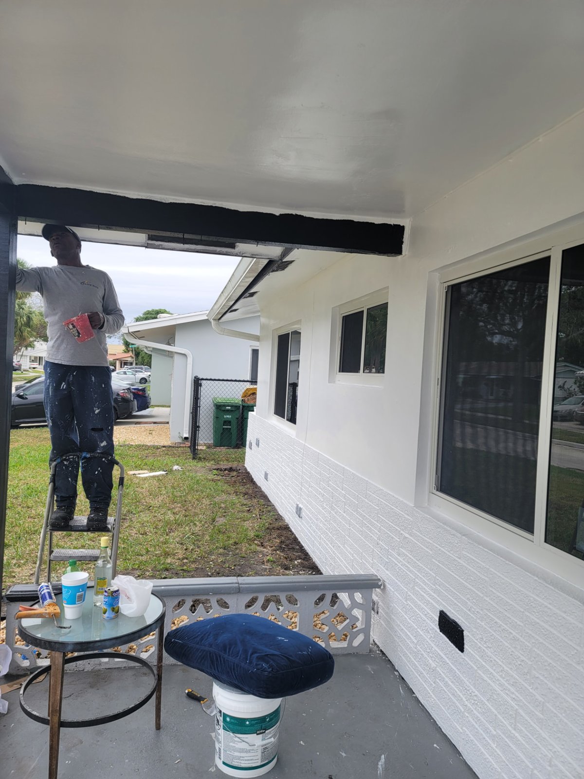 Repainted porch and exterior trim on a North Miami home